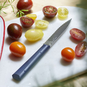 Opinel | N°313 Les Essentiels + Serrated Paring Knife Blue on cutting board