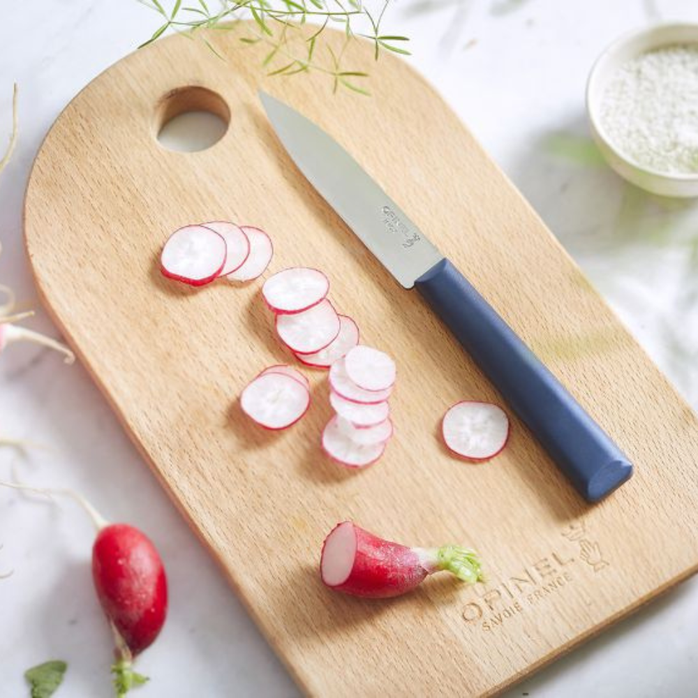Opinel | N°312 Les Essentiels+ Paring Knife Blue on cutting board