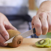 Opinel | N°313 Les Essentiels + Serrated Paring Knife Blue cutting kiwi