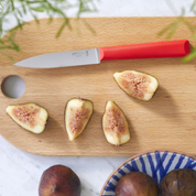Opinel | N°312 Les Essentiels+ Paring Knife Red on cutting board