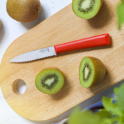 Opinel | N°313 Les Essentiels + Serrated Paring Knife red on cutting board
